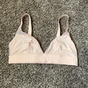 Parade pink triangle bralette.